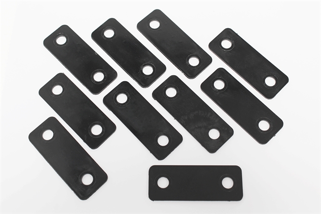 Mellemlæg til dørhængsel